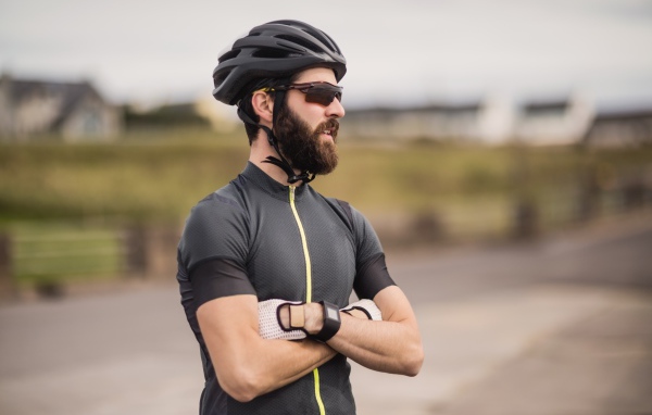Male cyclist in black helmet