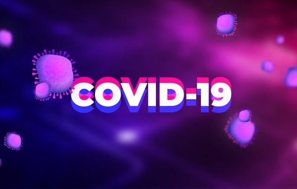 Надпись COVID-19 коронавирус на фиолетовом фоне