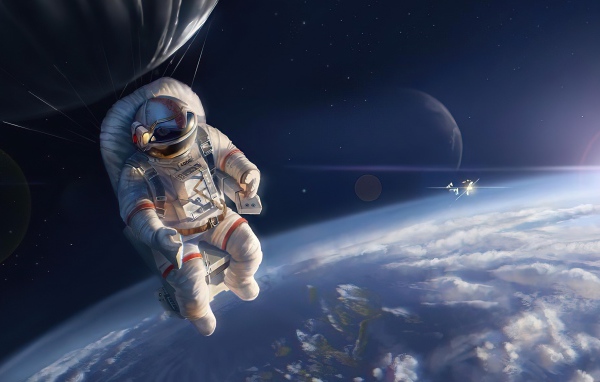 Астронавт вышел в открытый космос над землей 