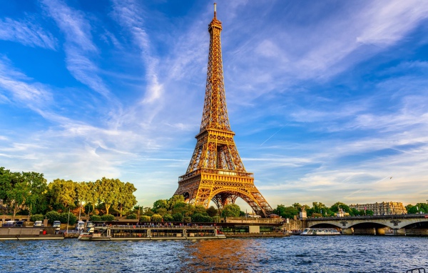 High Eiffel Tower under the beautiful sky of Paris, France