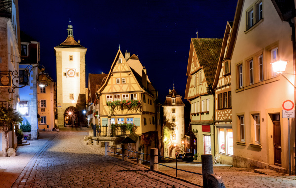 Beautiful houses on the night street of Rothenburg city, Germany