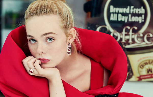 Beautiful girl, actress El Fanning in a red outfit