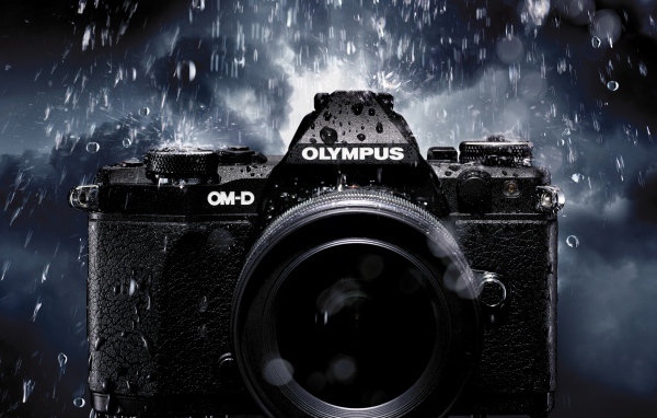 Old olympus camera in the rain