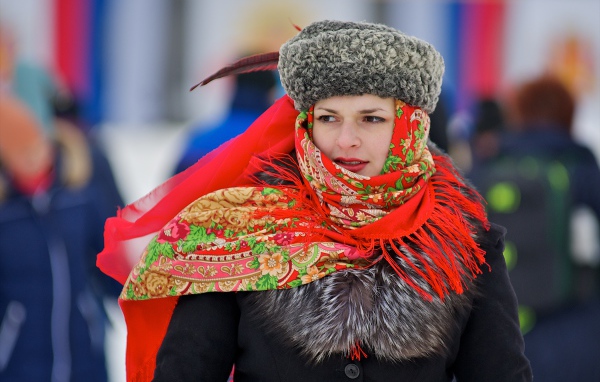 Russian girl with a red scarf on her head