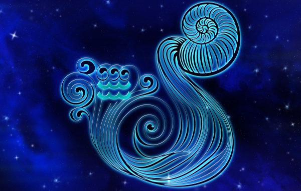 Beautiful sign Aquarius on a blue background