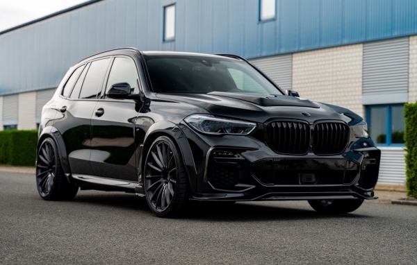 Черный автомобиль Prior-Design PDG5XWB Widebody Aerodynamic Kit