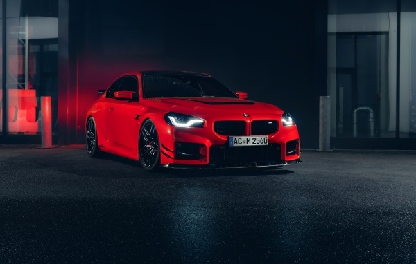 Красный автомобиль AC Schnitzer ACS2 Sport 2023 года