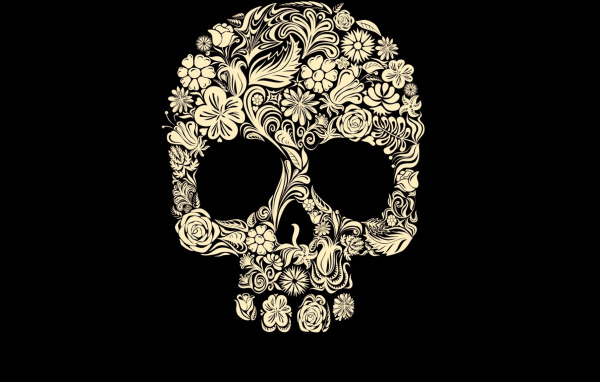 Череп из цветов на черном фоне