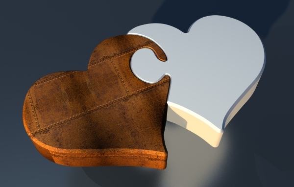 Пазл из двух сердец на сером фоне