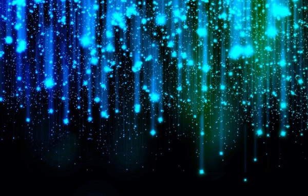 Яркие искры летят вниз на черном фоне