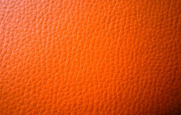 Оранжевый кожаный фон 