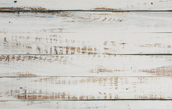 Окрашенная белой краской деревянная поверхность