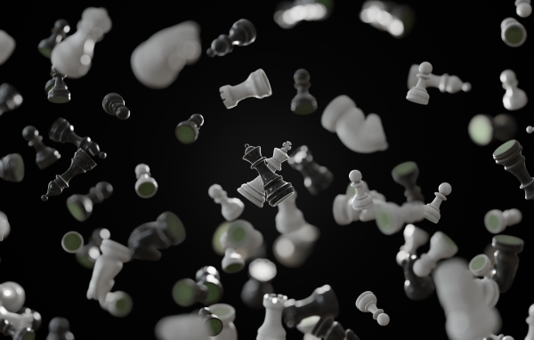 Черные и белые шахматные фигуры парят в воздухе