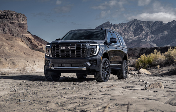 2025 GMC Yukon Denali Ultimate Large SUV in the Mountains