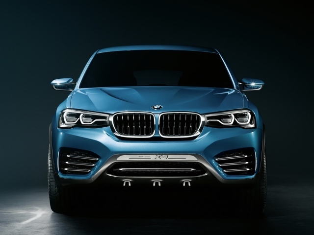 BMW X4 crossover on dark background