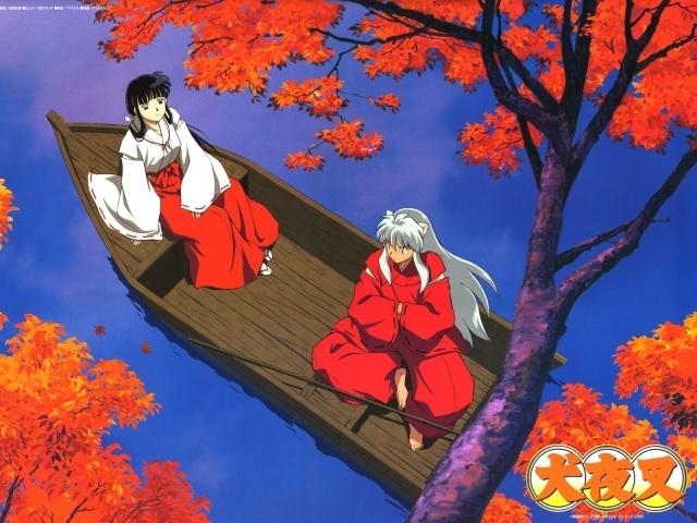 	   Two girls in a boat in the autumn