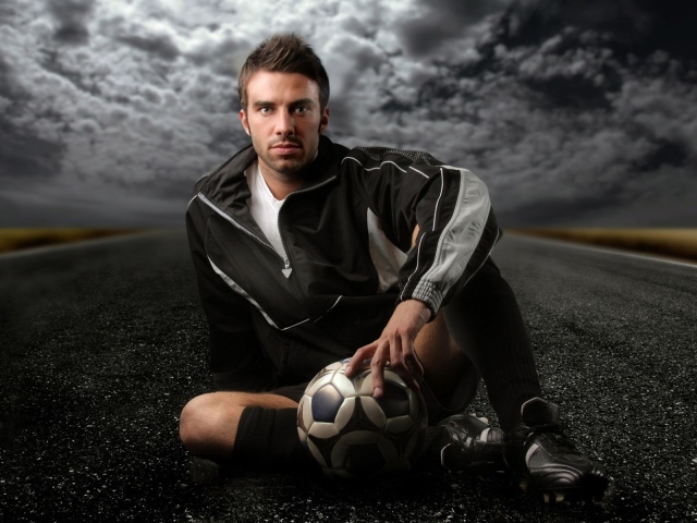 Footballer on the road