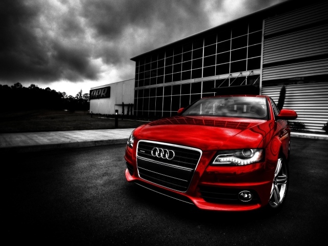 Red Audi on a dark background