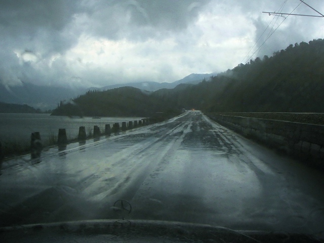 The road by the sea in the rain
