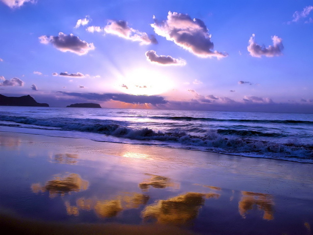 	   Reflection of clouds on the beach