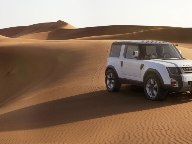 White Land Rover in the desert