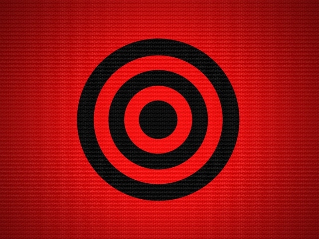 Черная мишень на красном фоне