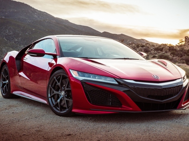 Красный автомобиль Acura NSX, 2017 на фоне гор 