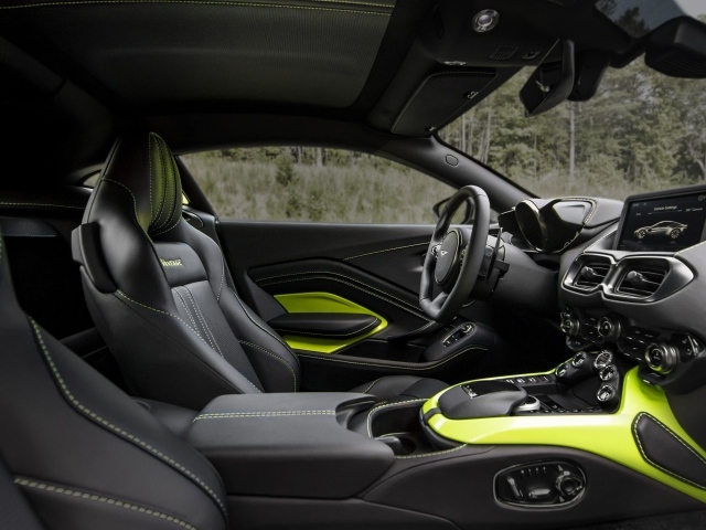 Black leather interior of the car Aston Martin Vantage, 2018