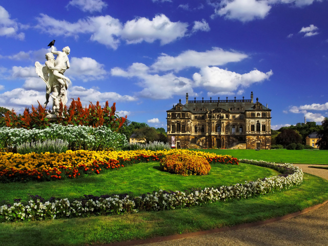 Sculpture and castle in the garden of Großer Harten, Dresden. Germany