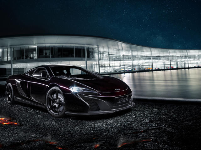 Car McLaren MSO 650S on the background of the glass dealership