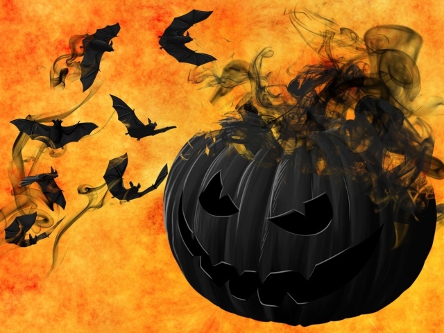 Черная тыква с летучими мышами на оранжевом фоне к Хэллоуину