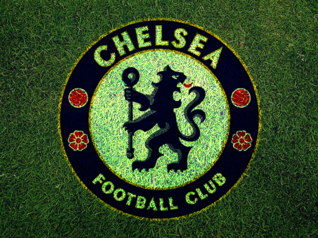 Логотип футбольного клуба Челси на зеленой траве