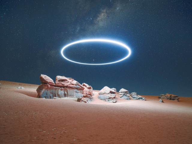 Big bright circle in the sky over the desert
