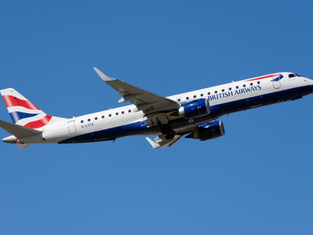 British Airways Embraer ERJ-190 passenger plane in the sky