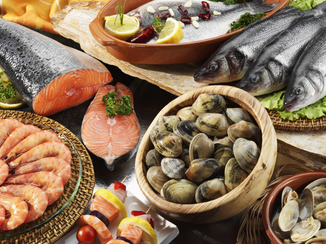 Mussels, prawns and fresh fish on the table