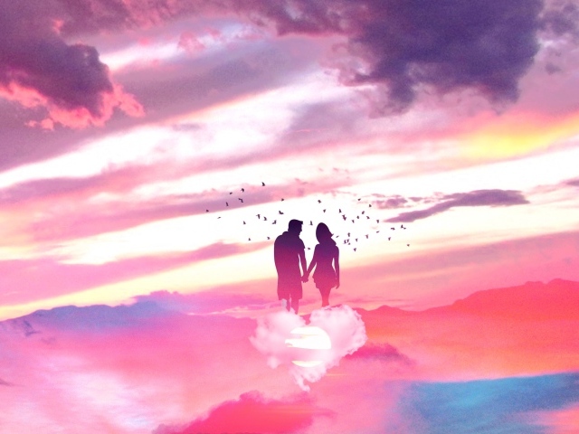 Силуэт влюбленной пары на облаке в форме сердца в небе 