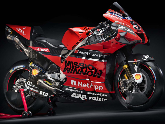 Red motorcycle Ducati Desmosedici GP20 2020 on a gray background