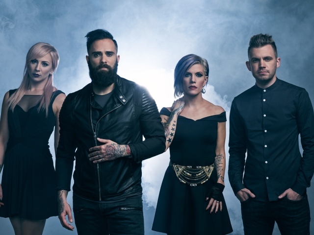 American rock band Skillet in black outfits