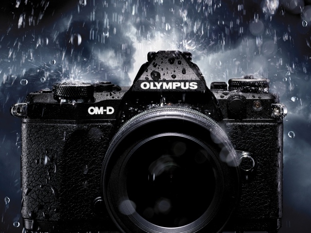 Old olympus camera in the rain