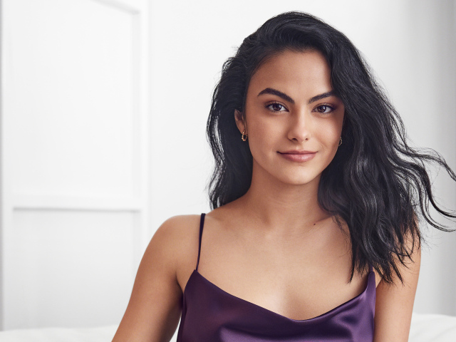 Bright brunette actress Camila Mendes