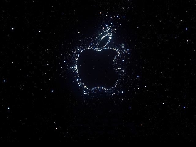Блестящий логотип Apple на черном фоне