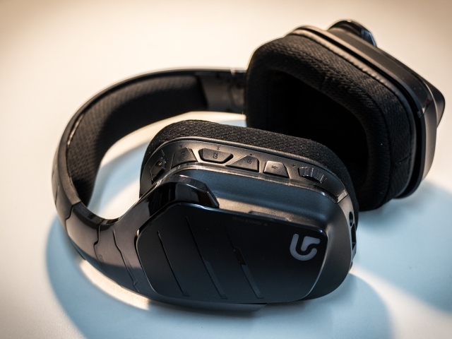 Big black headphones on a gray background