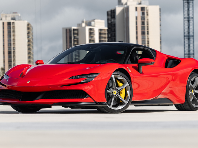 Красный спортивный автомобиль Ferrari SF90 Stradale