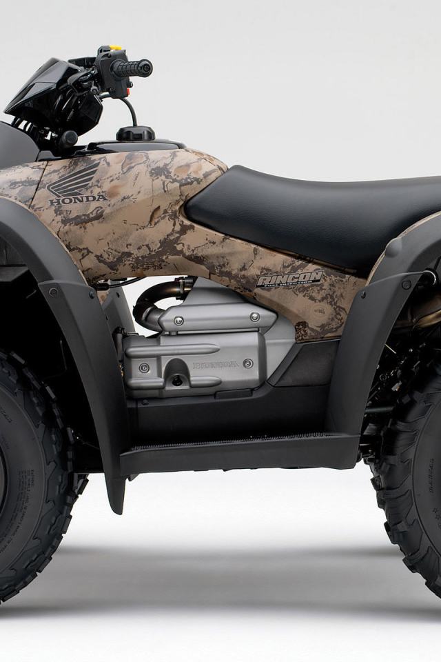 Коричневый Honda квадроцикл