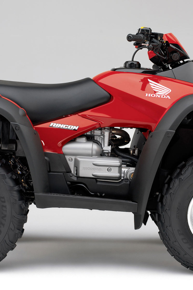 Красный Honda Rincon квадроцикл