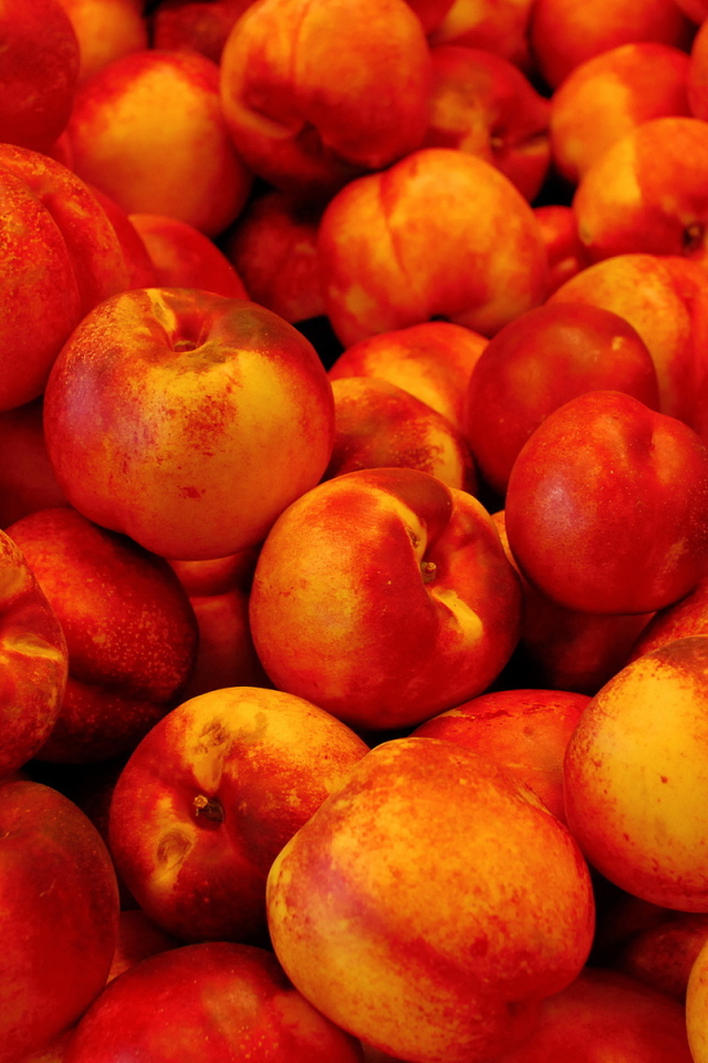 Куча персиков
