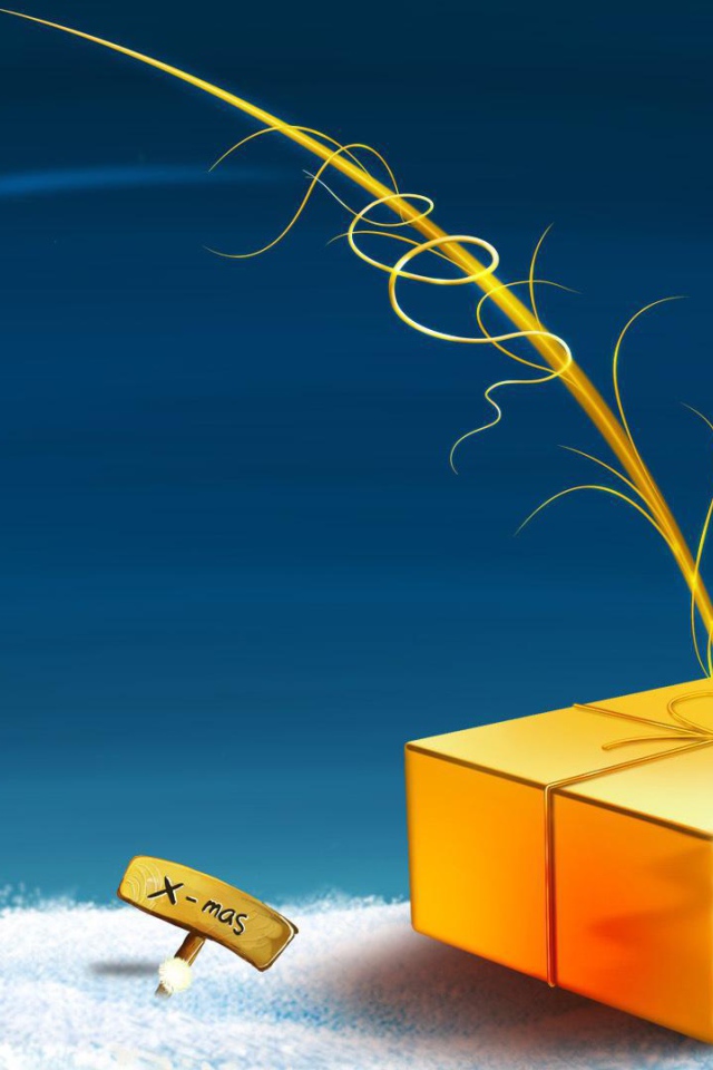 Жёлтая подарочная коробка лежит на снегу на рождество