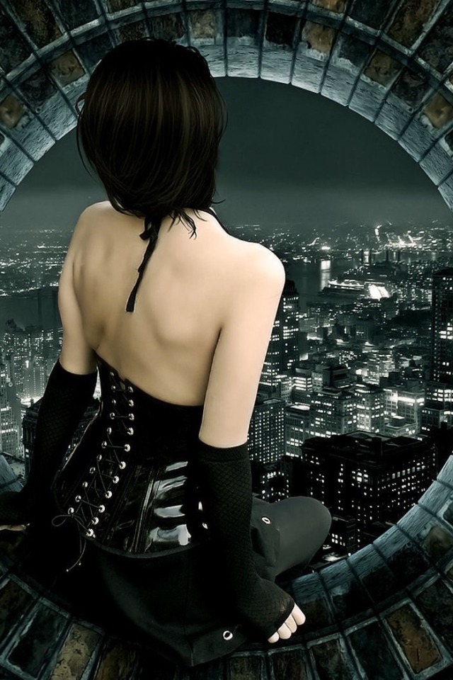 Девушка смотрит на город