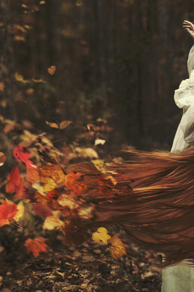 Girl with long hear, autumn leaves