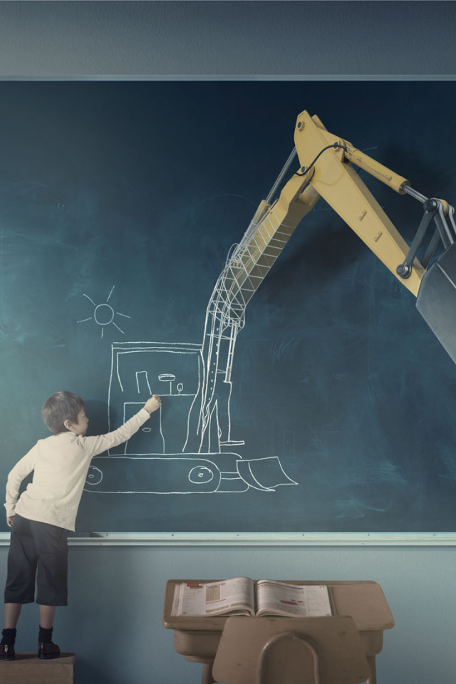 Мальчик рисует экскаватор